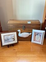 Trunk with carved goose, framed print, framed Mom plaque