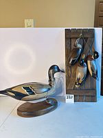 Overall view of standing duck decoy and wall plaque together