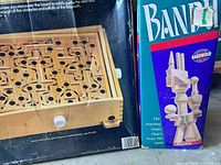 Front of both game boxes showing Bandu and Tournament Labyrinth titles