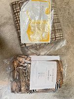 Overview of both sealed packages together on floor