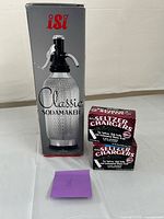 Front view of iSi Classic Sodamaker box with two MrFizz charger boxes