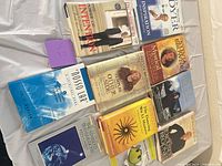 All ten books laid out, front covers visible