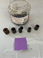 Jar and row of sockets front view