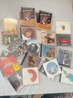 Overview of all CDs laid out on table