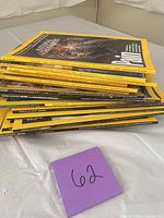 Stack of National Geographic magazines on table