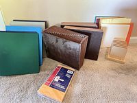 Group shot showing binders, accordion files, desktop sorter, envelopes