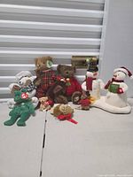 Group shot of all seven holiday plush figures