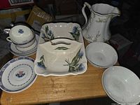 Group shot of all porcelain pieces on table