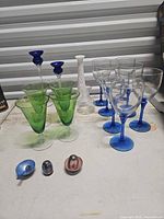 Group shot showing all glass items in lot