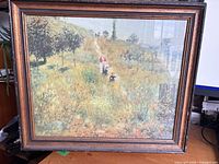 Front view of framed Renoir print