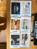 Six of the Subjectively Objective zines laid out showing covers and issue/photographer names