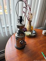Full view of Stanley Cup shaped lamp on table