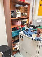 Full front view of teak veneer bookshelf with five shelves