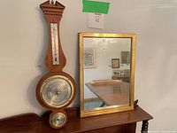 Front view of mirror and barometer together