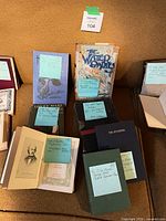 Group shot of all six hardcovers on couch