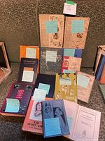 Group view of all hardcover books in lot