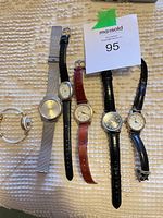 All six watches laid out for overall view