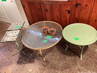 All items grouped: glass table, green table, two mosaic tray tops with stands, two terracotta saucers