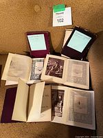 Overview of six Shakespeare volumes opened to illustrated pages