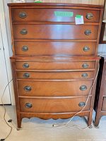 Front view showing full dresser with seven drawers