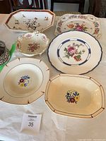 Overview of all six serving pieces on table