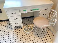 Vanity desk, chair, and floral scale in situ