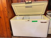 Chest freezer front view with lid open