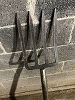 Close-up of fork head with four tines