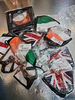Assorted packaged face masks showing Union Jack and tricolour designs
