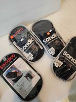 Four packaged Sondico protection pads displayed front view
