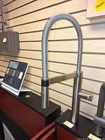 Full view of Blanco pull-down faucet on display board