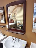Front view of wall mirror above sink