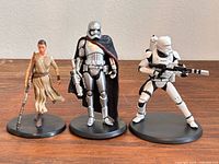 Front view of all three Star Wars PVC figurines on bases