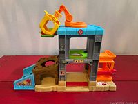 Front view of entire Little People Smart Stages construction playset showing ramps, tunnel, crane and overall condition