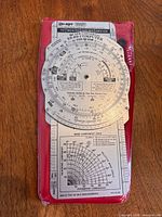 Factory-sealed APR E6-B9 computer in red case