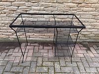 Full view of wrought iron workstation front angle