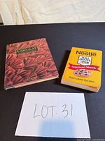 Front covers of both cookbooks displayed side by side