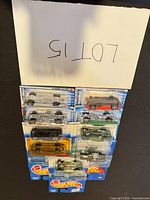 Group shot of 11 sealed Hot Wheels cars on blister cards