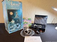 All items overview with Rogar Estate box, lever corkscrew case and KitchenAid parts displayed