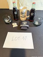 Group shot of all drinkware items and magnet