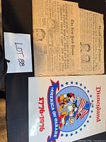 Overview of both the 1927 New York Times front page and the Disneyland 1776–1976 poster