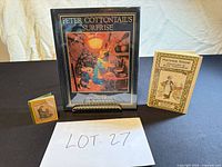 All three books front view with lot number card