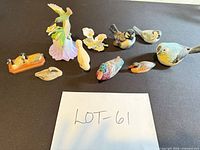 Group shot of all ten figurines on table