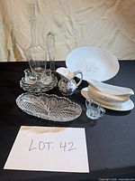 Group shot of all serveware items in lot