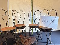 Front view of all four chairs with wire bird basket