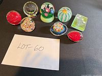 All nine paperweights arranged together