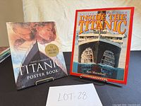 Front covers of both Titanic books on stands