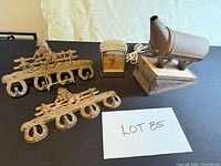 Overall lot: two cast iron hook racks, spotlight lamp, alarm clock
