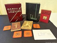 Full lot overview showing all books, game boxes and coasters