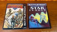 Front covers of both BattleTech manuals side by side